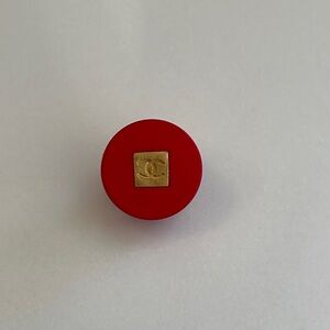 Chanel red round button w/ gold square plated CC